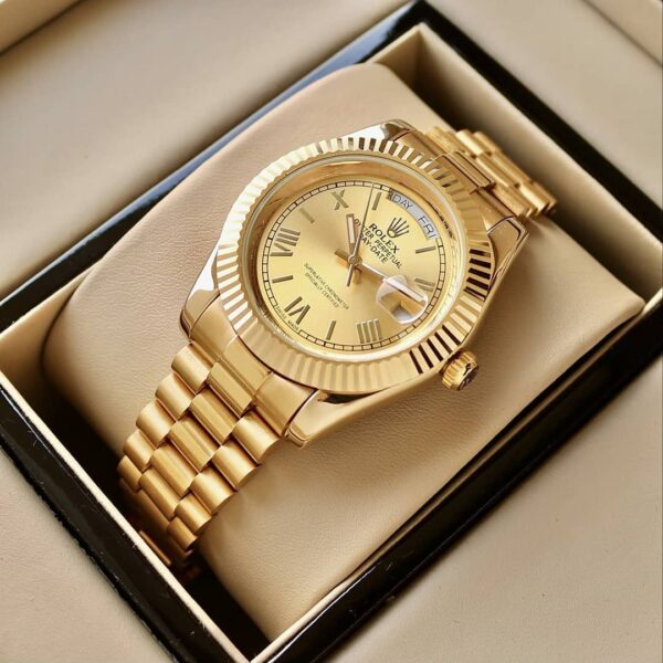 Rolex day date gold